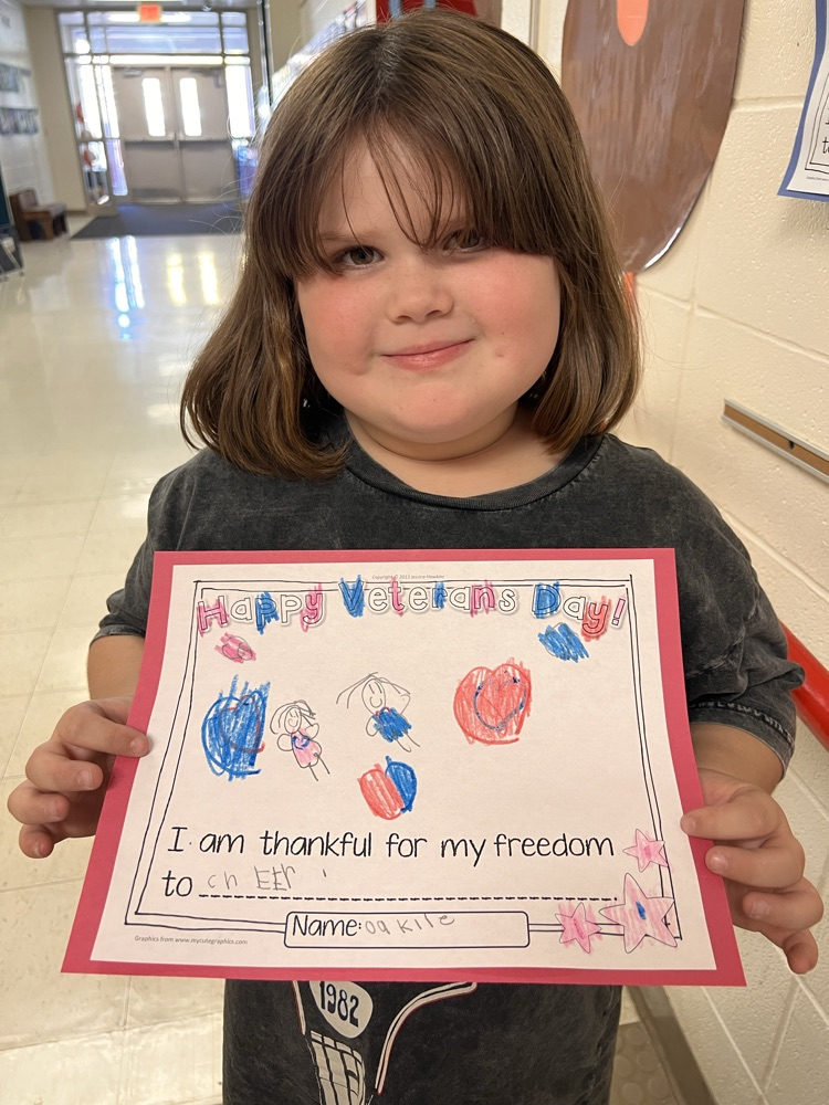 girl holding artwork 