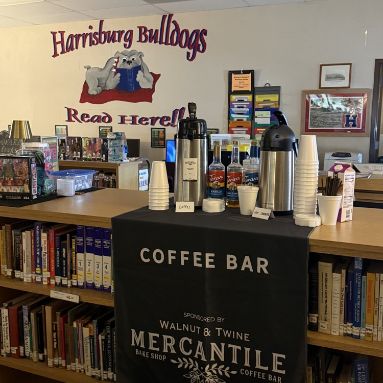 a coffee bar with Walnut & Twine logo is set up in the High School Library