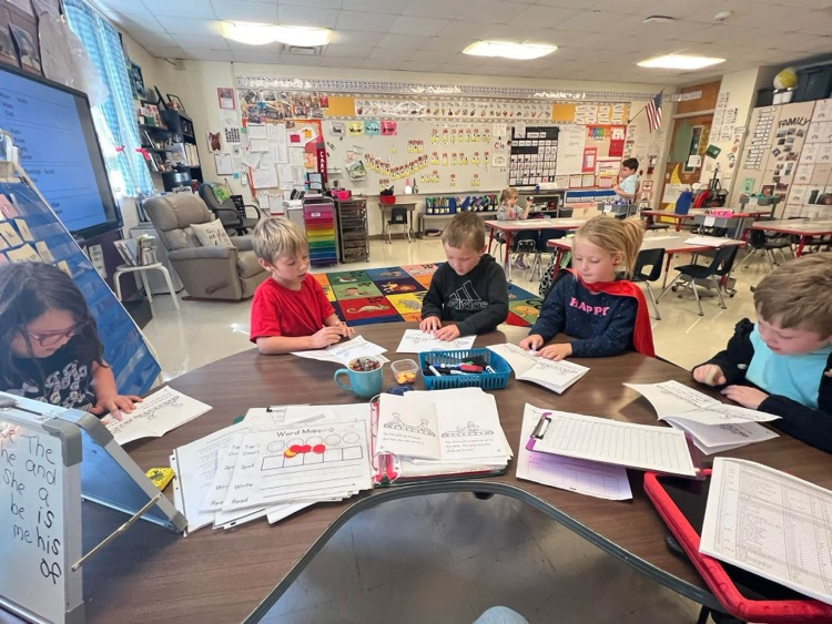 students reading in a group 