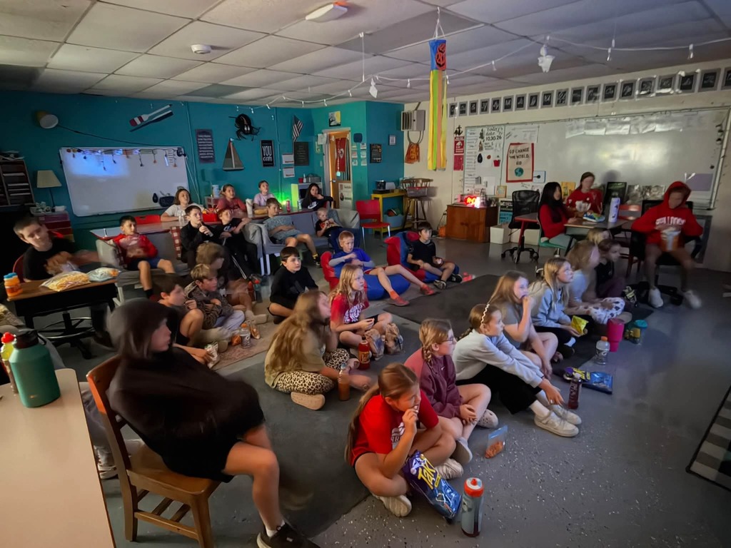 Fifth grade students watching the movie Wonder.