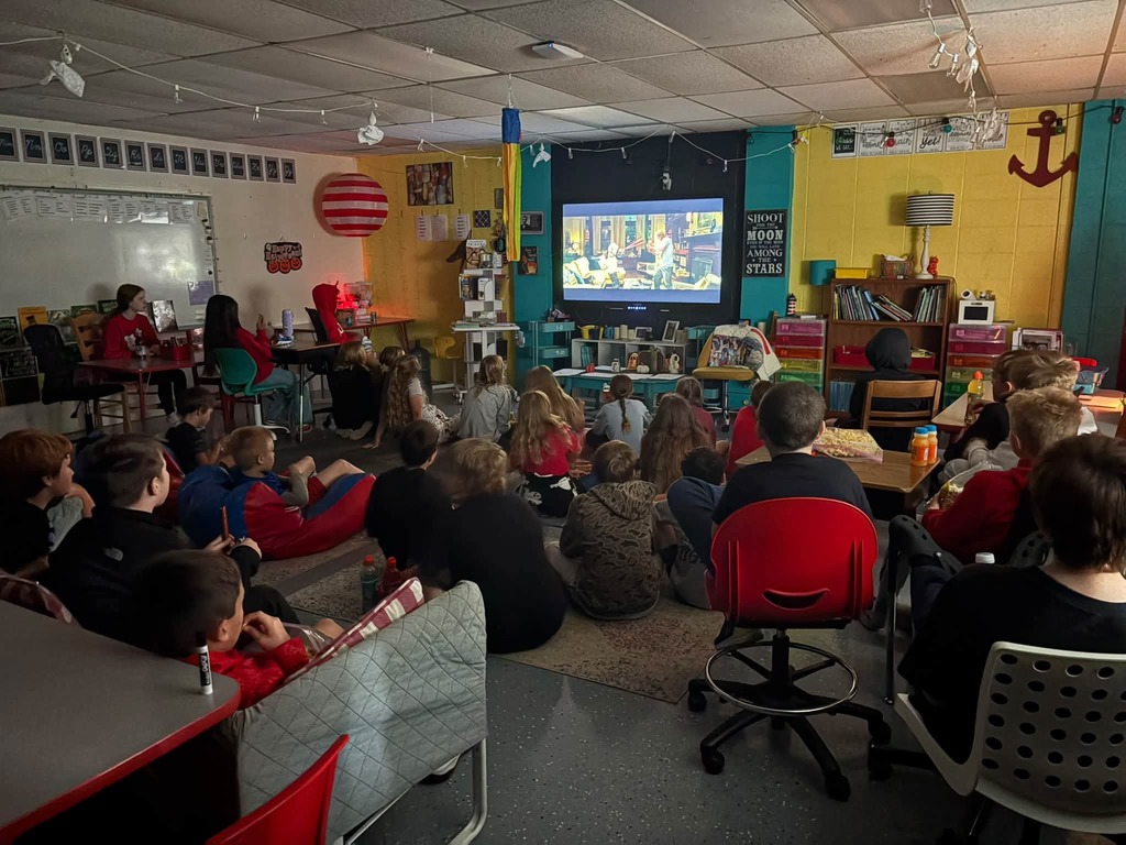 Fifth grade students watching the movie Wonder.