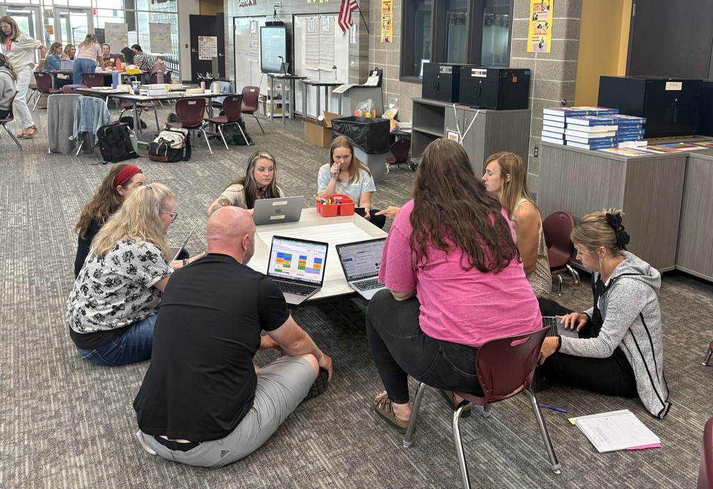 elementary teachers reviewing math curriculum
