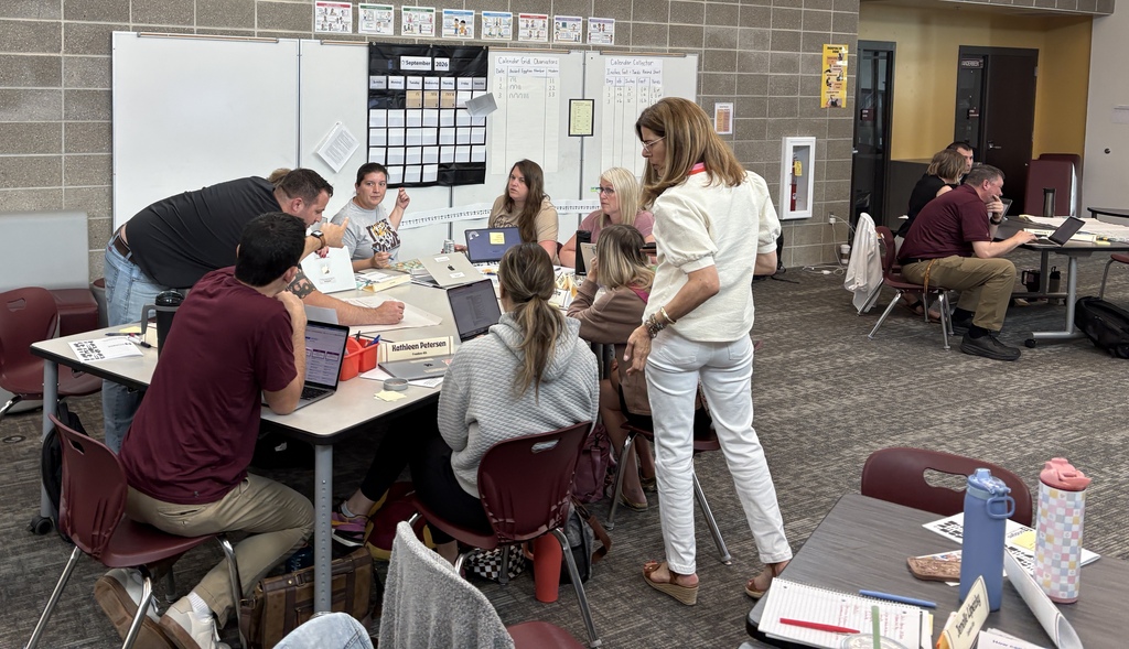 elementary teachers reviewing math curriculum