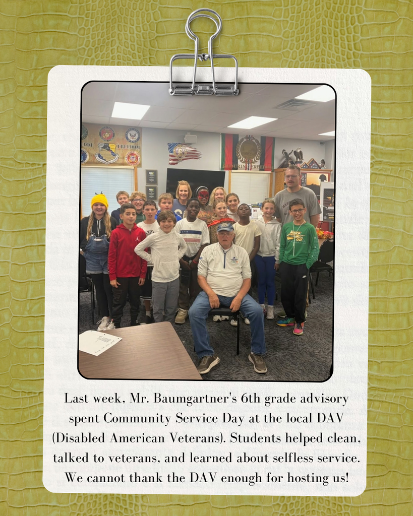 Mr. Baumgartner's and his advisory class are pictured standing next to a veteran during HNMS Community Service Day.