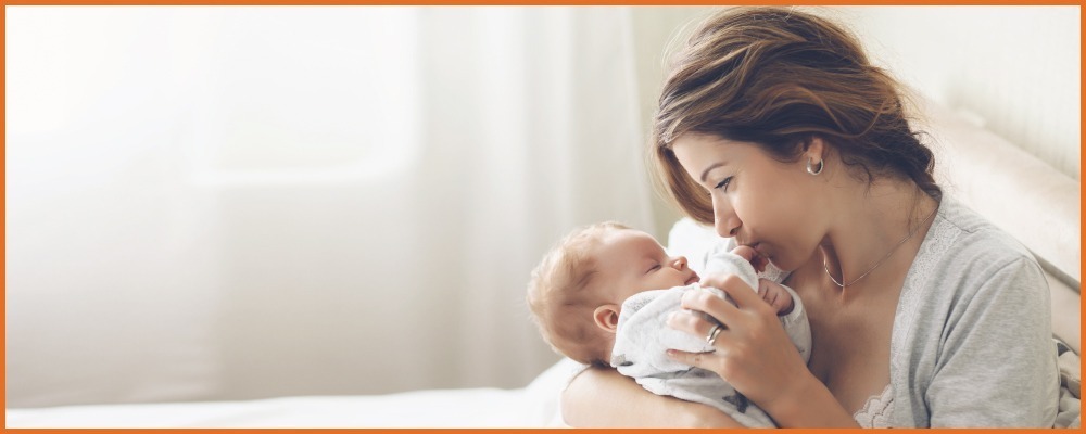 mother holding her baby