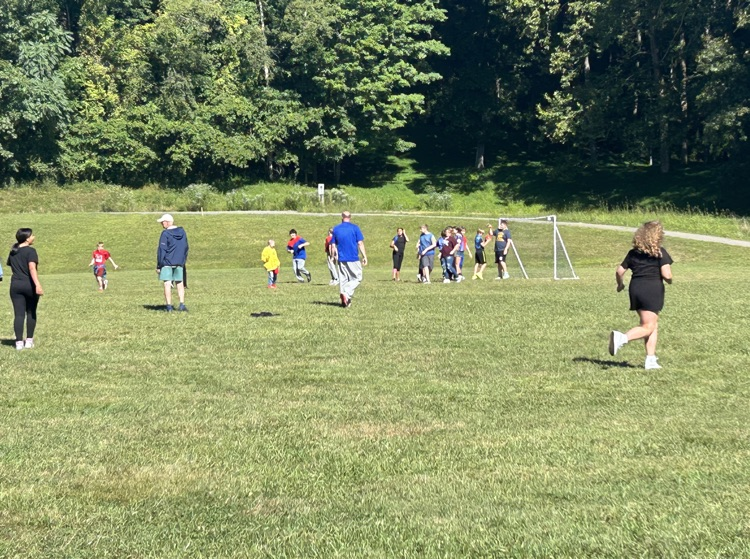 Students playing handball outside