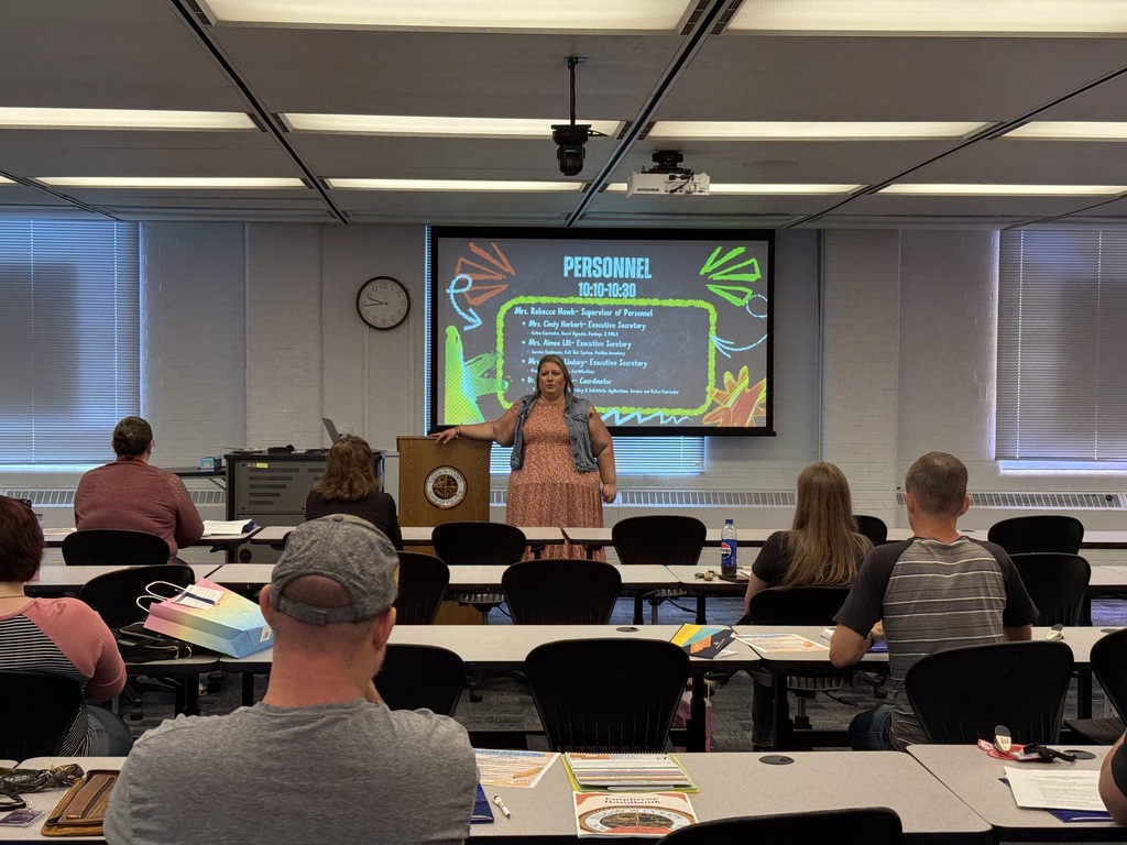 Rebecca Hawk addresses the crowd for orientation