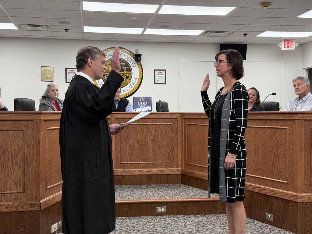 Dr. Van Meter takes the oath of office
