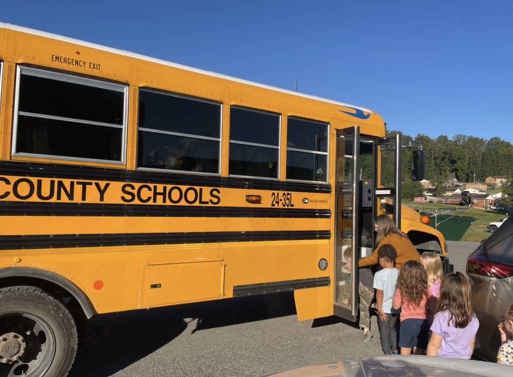 students loading onto a bus