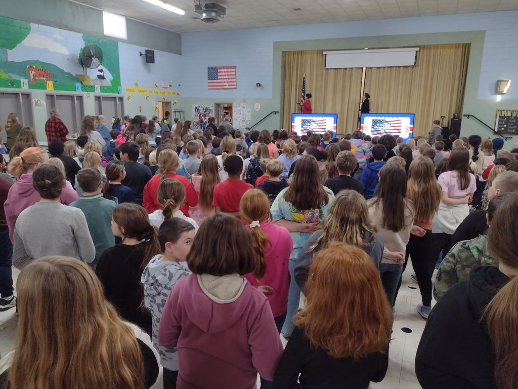 Students saying the pledge to the flag.