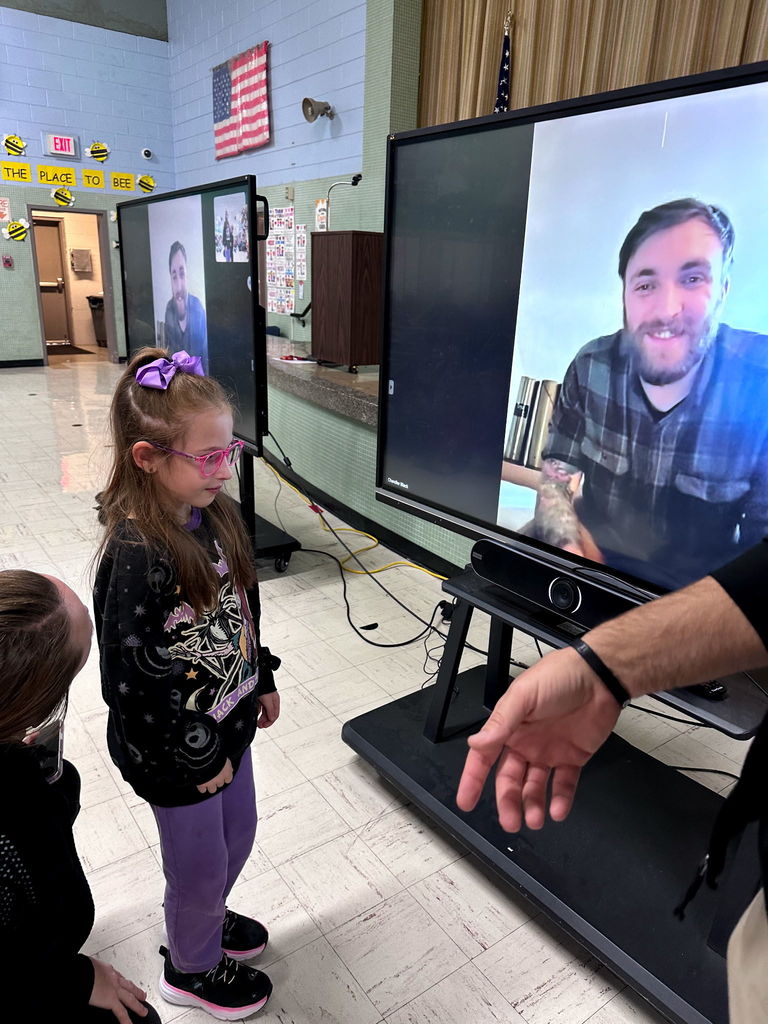 Student getting to see her uncle on zoom chat