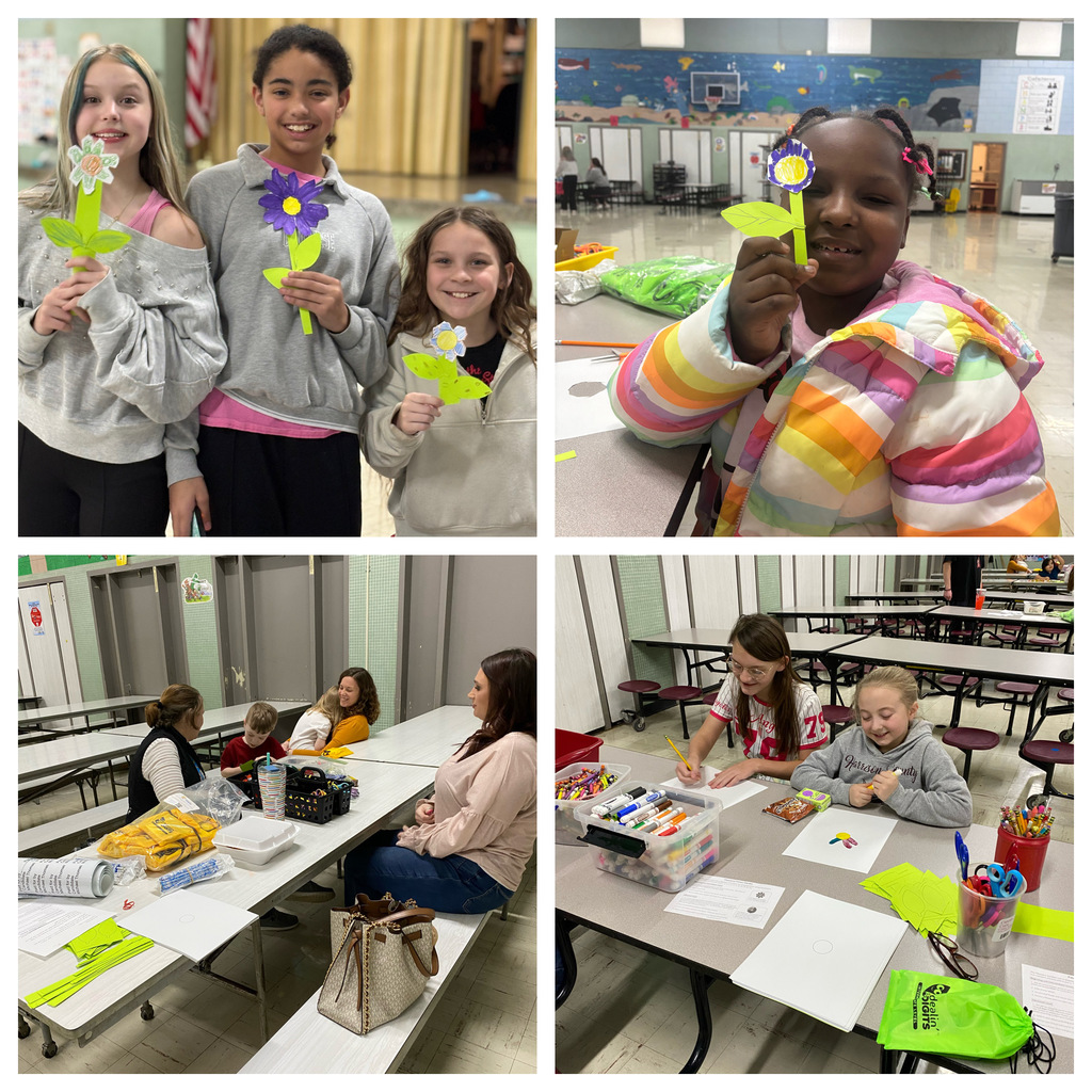 students and parents making flowers