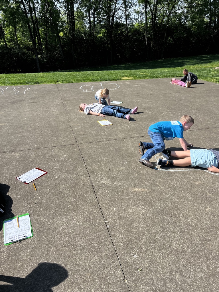 student using chalk to measure their body