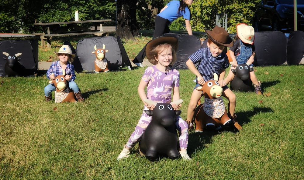 kids on play horses