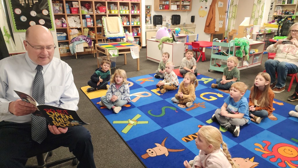 Dr. Villines reading to students