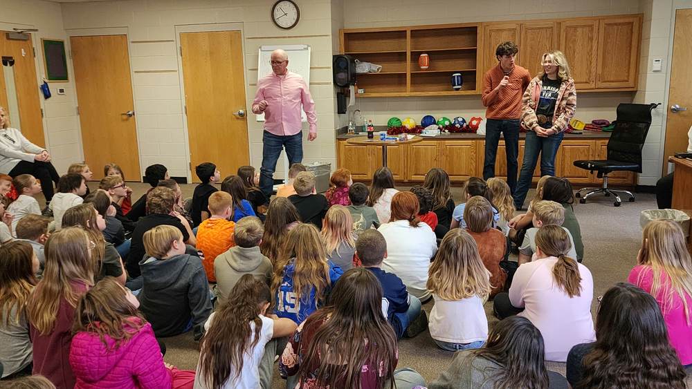 4th graders listen to presentation