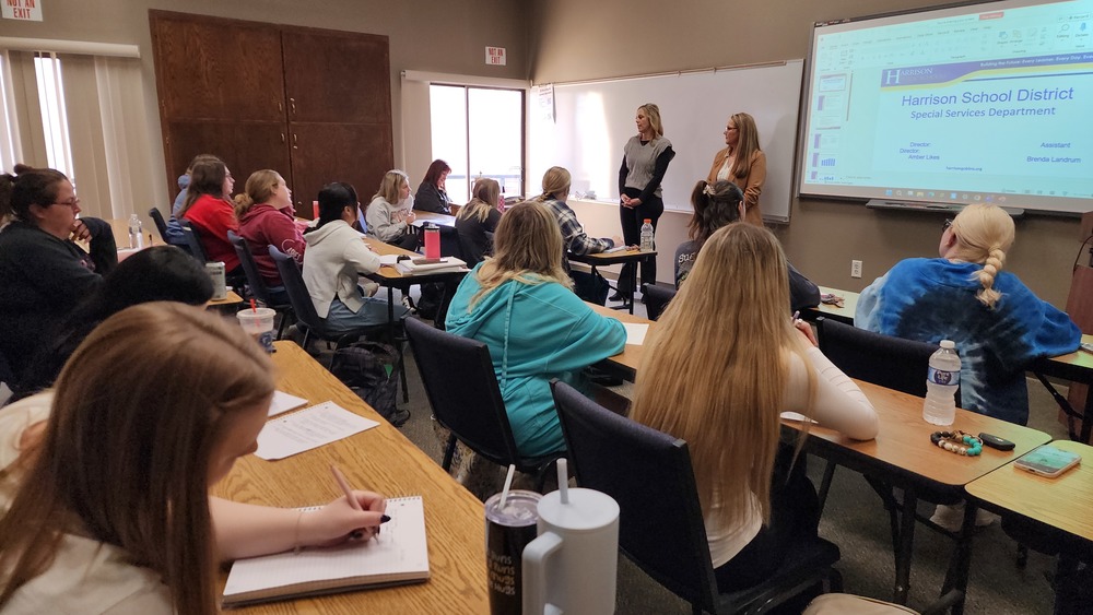 Amber Likes and Brenda Landrum presenting to students