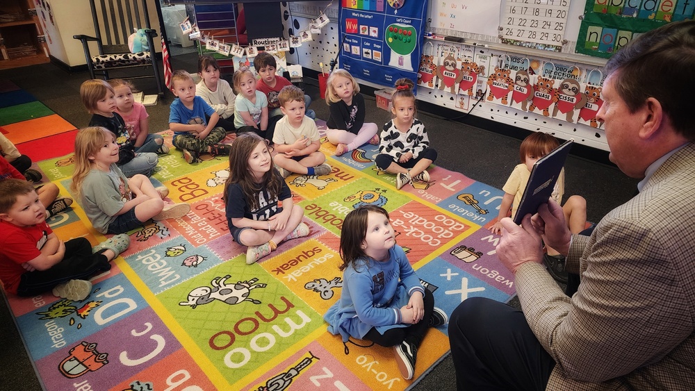 Dr. Pratt reading to students