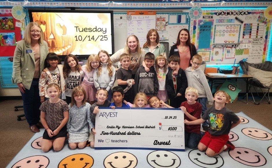 Emilie Ply and students with Arvest team