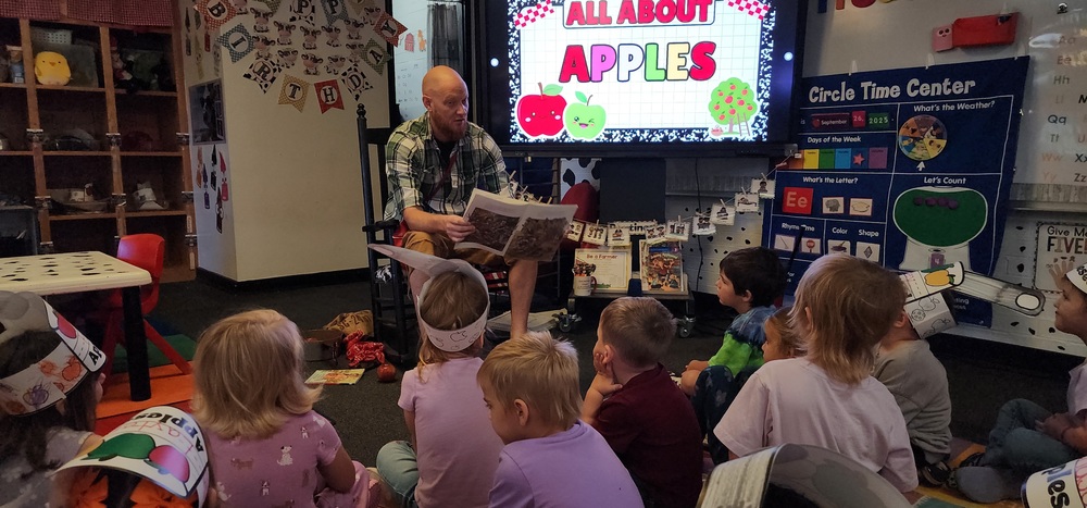 Mr. Magness reads to kids