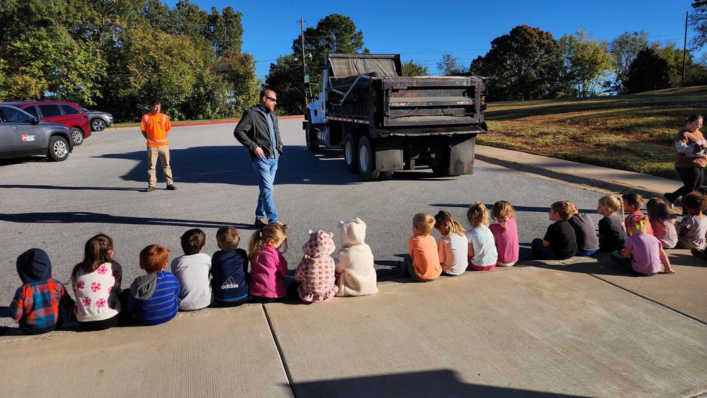Students in front of ARDOT dump truck