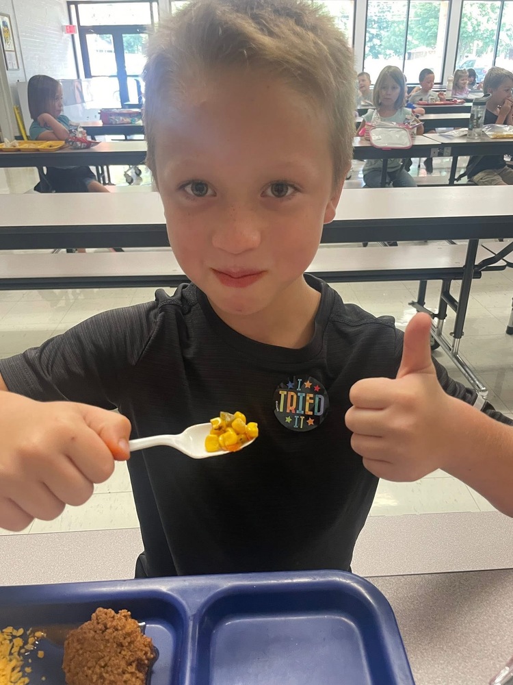 Student with thumbs up