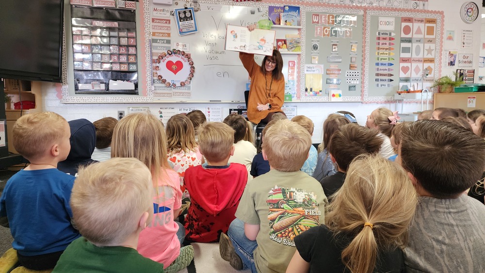 Mrs. Wilson reading to students