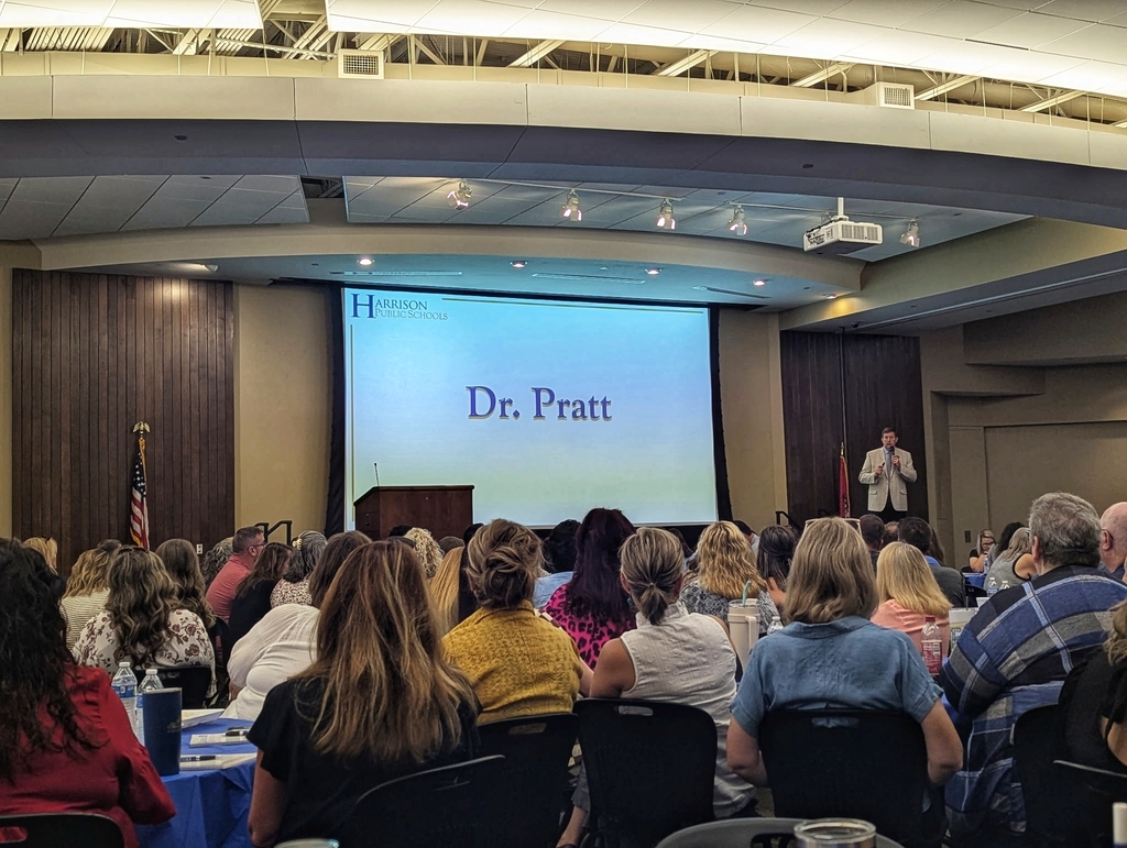 Dr. Pratt addresses Harrison staff members.