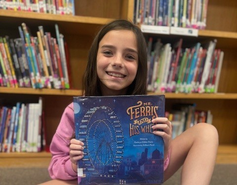 student in media center