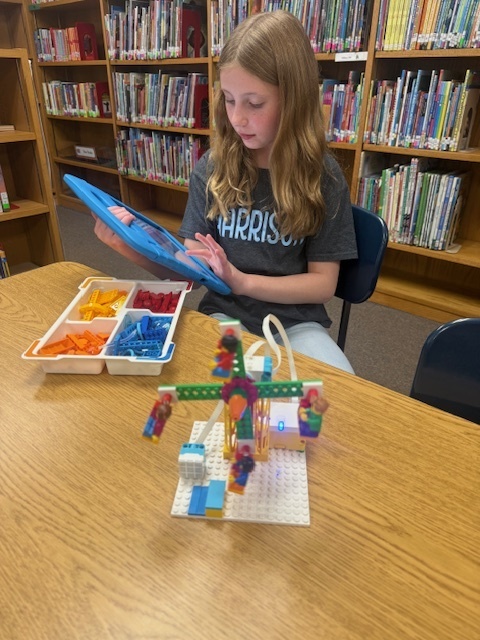 student in media center