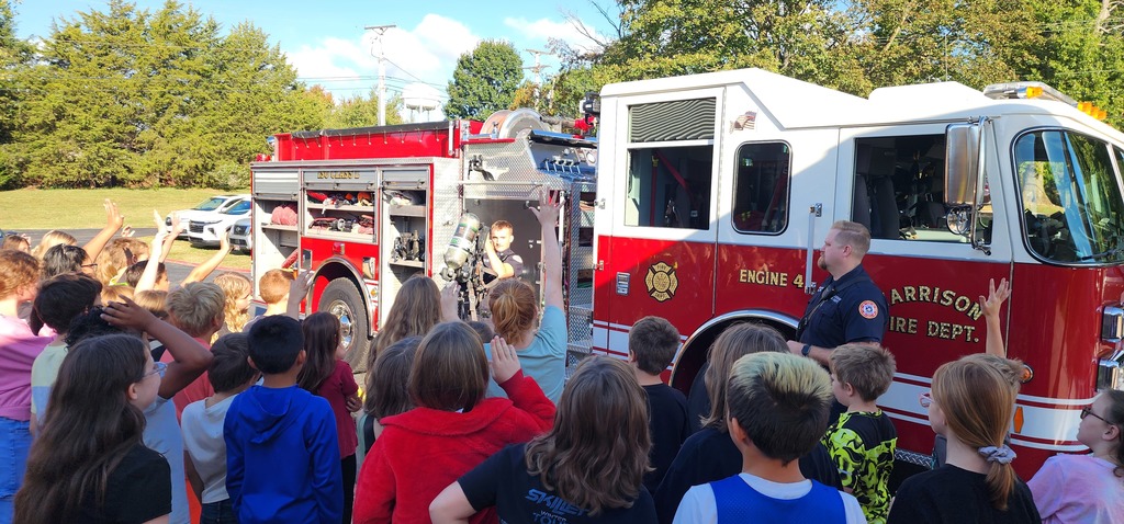 students listening to fireman