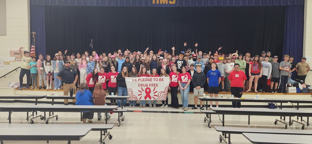 So proud of our Harrison High School Project Ignite group! They delivered a powerful drug and vape-free message to the students at Harrison Middle School as part of our Red Ribbon Week activities.  The presentation was impactful, featuring a great skit that exposed how corporations target kids with flavored vapes and stylish designs. They also discussed the serious harmful effects of drugs and alcohol on students' future goals and ended with some fun, engaging trivia.  Check out the future leaders who pledged to be drug-free! Let's keep supporting healthy choices!