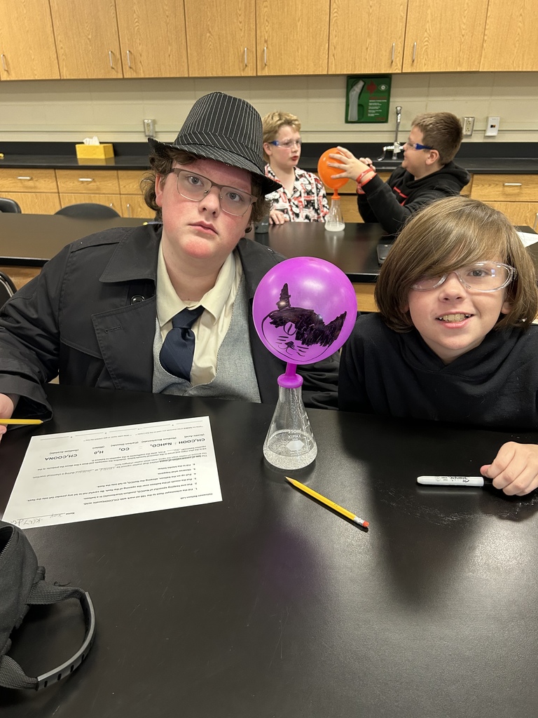 🎈 Science in Action! Mrs. Scoggins’ science students experimented with chemical reactions to review the Law of Conservation of Matter and balancing equations. ⚗️  By mixing acetic acid (vinegar) and sodium bicarbonate (baking soda), students produced carbon dioxide gas — enough to inflate their balloons! 🎈💙💛  #HarrisonMiddleSchool #GreatGoblins #HMSScience #HandsOnLearning #STEMFun #ChemicalReactions