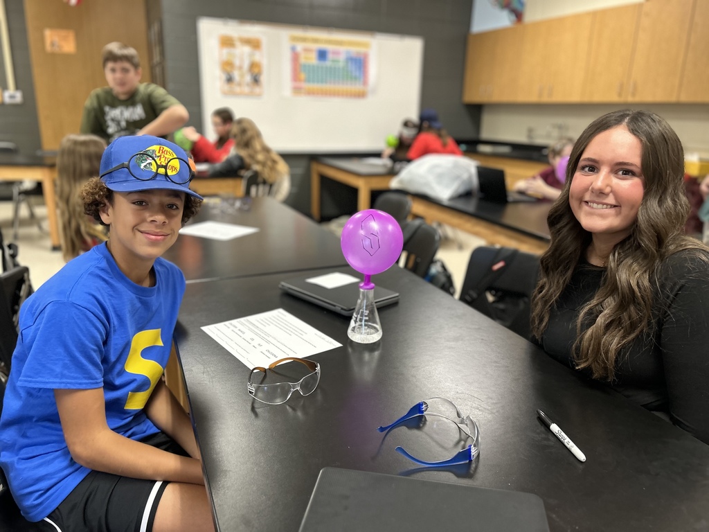 🎈 Science in Action! Mrs. Scoggins’ science students experimented with chemical reactions to review the Law of Conservation of Matter and balancing equations. ⚗️  By mixing acetic acid (vinegar) and sodium bicarbonate (baking soda), students produced carbon dioxide gas — enough to inflate their balloons! 🎈💙💛  #HarrisonMiddleSchool #GreatGoblins #HMSScience #HandsOnLearning #STEMFun #ChemicalReactions