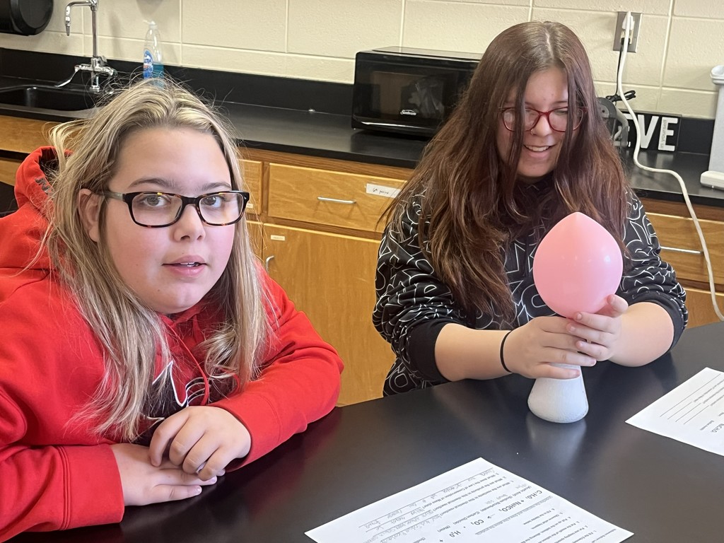 In Mrs. Bryant’s science class, students experimented with acetic acid and sodium carbonate. When these two reactants were combined inside a balloon, they produced water, carbon dioxide, and sodium acetate — causing the balloon to inflate!  Students observed that the mass of the reactants equaled the mass of the products, demonstrating the Law of Conservation of Matter. ⚗️💙💛  #HarrisonMiddleSchool #GreatGoblins #HMSScience #HandsOnLearning #STEMFun #ConservationOfMatter