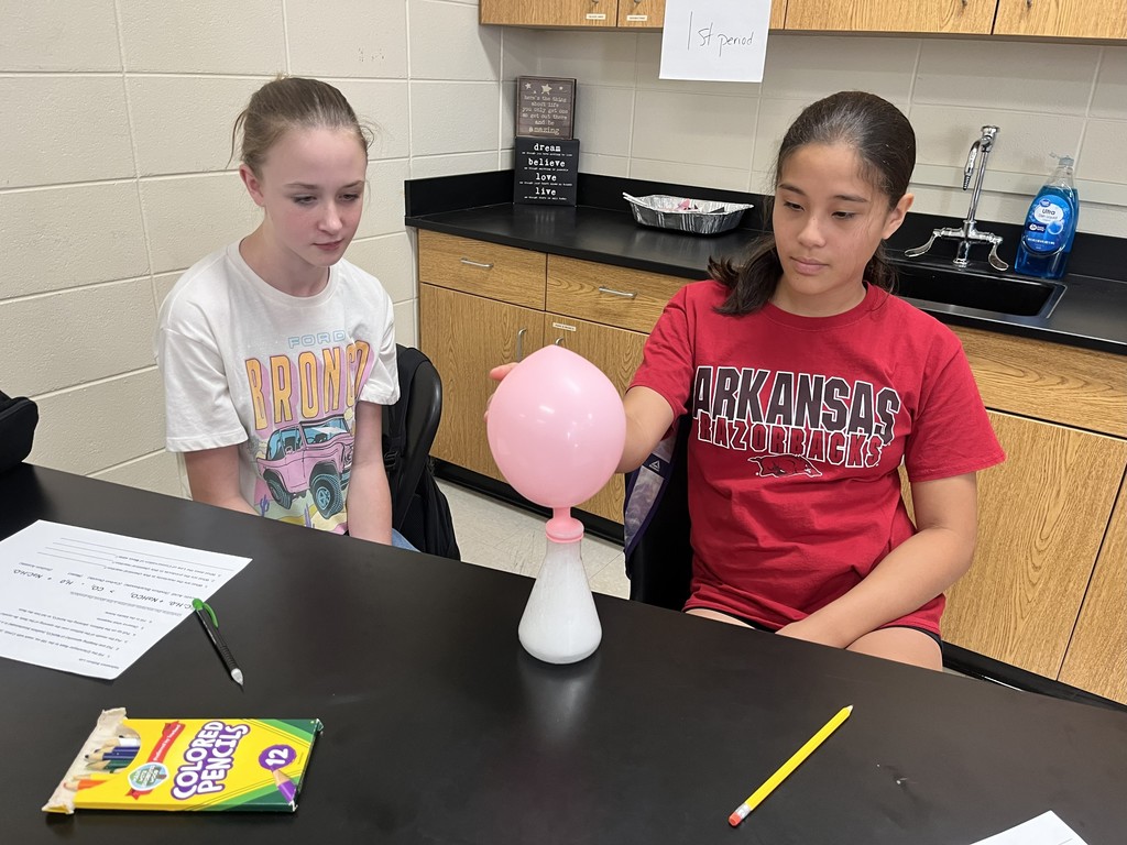 In Mrs. Bryant’s science class, students experimented with acetic acid and sodium carbonate. When these two reactants were combined inside a balloon, they produced water, carbon dioxide, and sodium acetate — causing the balloon to inflate!  Students observed that the mass of the reactants equaled the mass of the products, demonstrating the Law of Conservation of Matter. ⚗️💙💛  #HarrisonMiddleSchool #GreatGoblins #HMSScience #HandsOnLearning #STEMFun #ConservationOfMatter