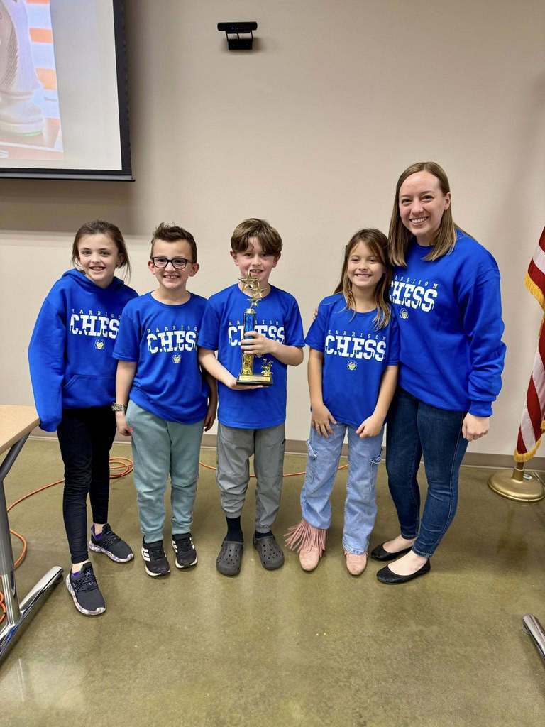 students with trophy