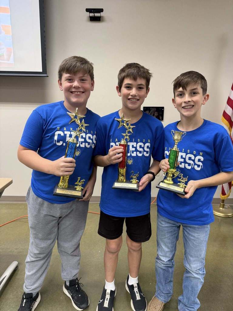 students with trophy