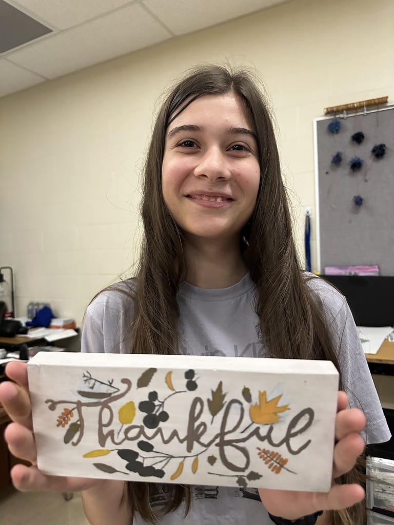 student with gratitude block