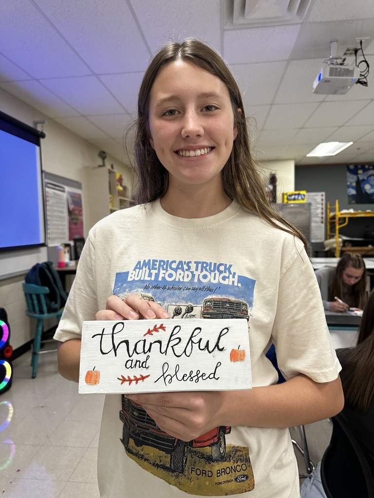 student with gratitude block