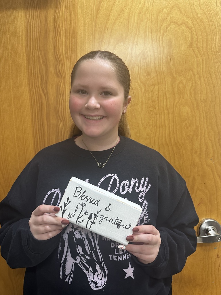 student with gratitude blocks