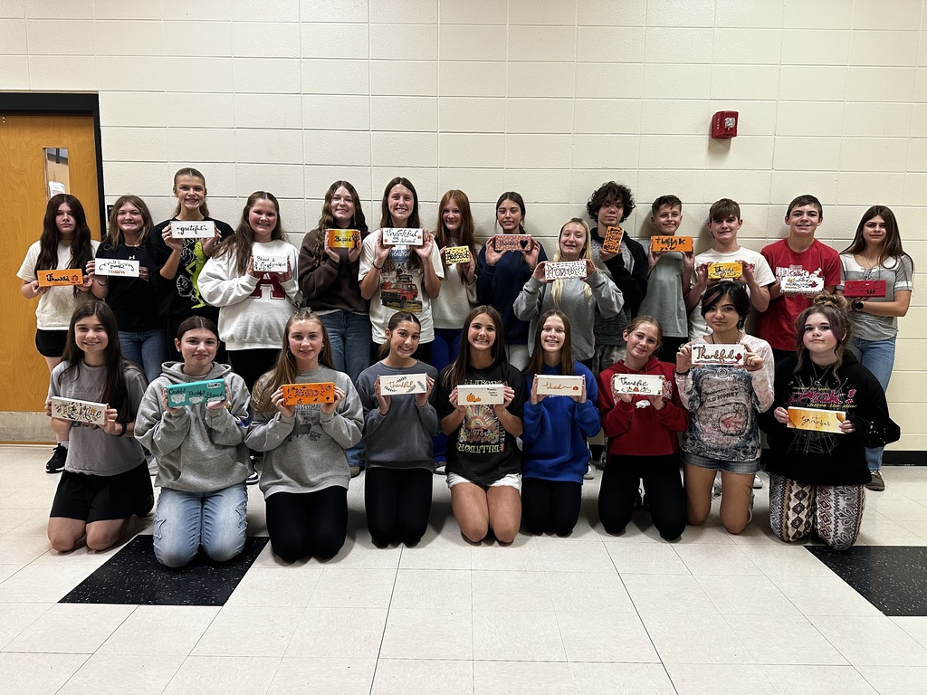 students with gratitude blocks