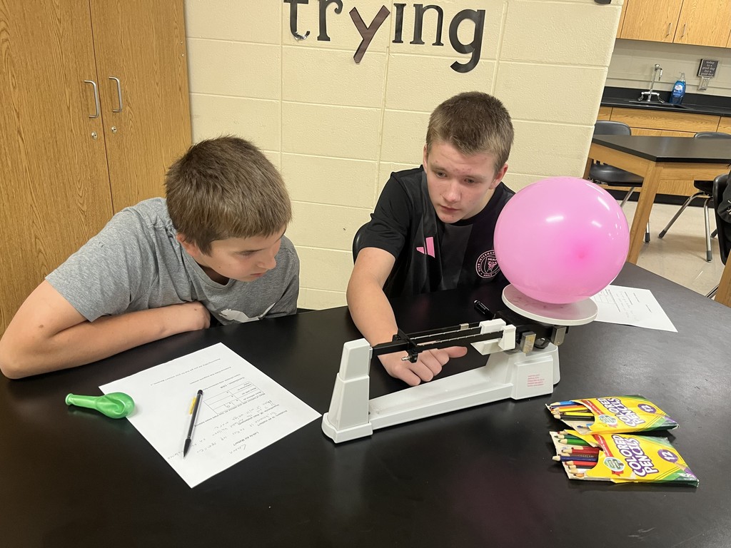 🧪🎈 Is Air Matter? Our 7th-Grade Scientists Say YES!  Mrs. Bryant’s 7th-grade scientists set out to investigate whether air is matter. Using balloons and a triple-beam balance, students compared the mass of a deflated balloon to an inflated one.  They discovered that the inflated balloon weighed more — proving that air has mass and takes up space!  Hands-on experiments like this help students see science in action! 💙💛  #HarrisonMiddleSchool #GreatGoblins #ScienceIsEverywhere #7thGradeScience #HandsOnLearning #FutureScientists