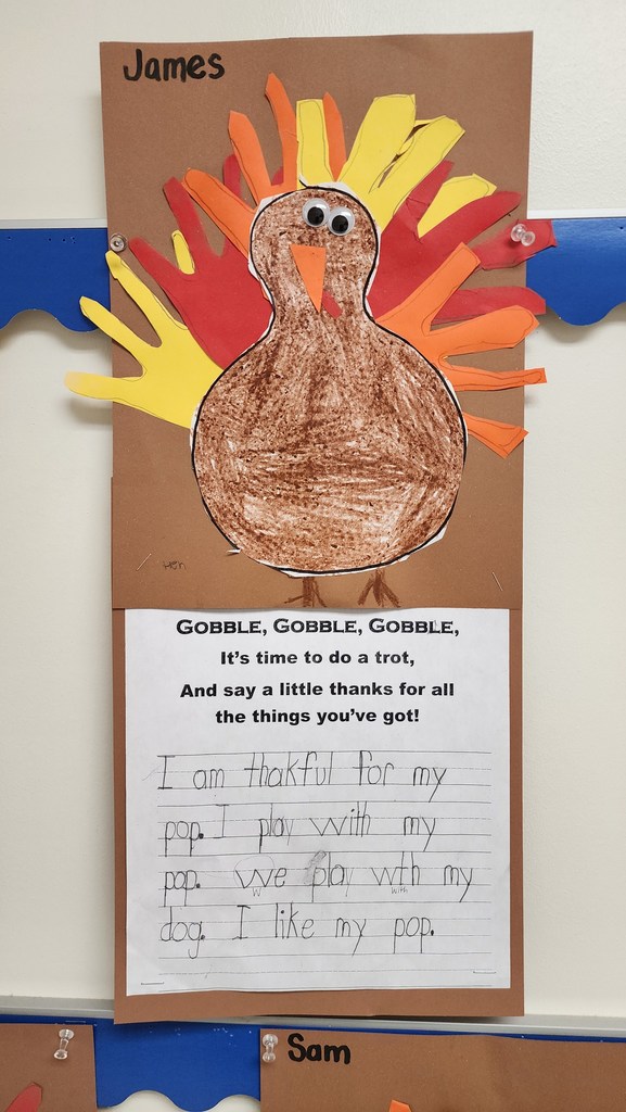 James	Thankful for his "pop" (grandpa/dad) and dog.