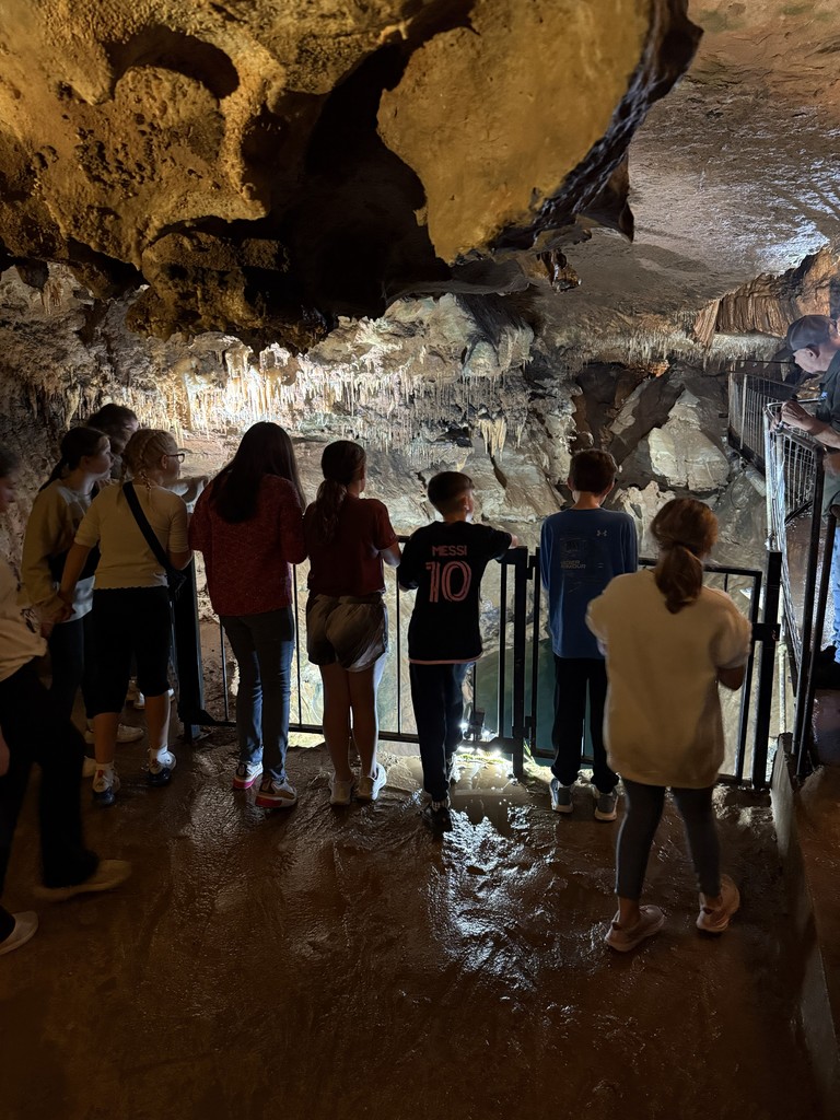 🪨💎 Science Club Adventure! 💎🪨  The Harrison Middle School 5th and 6th Grade Science Club had an amazing time exploring Cosmic Cavern in Berryville, AR! 🌎✨  Students explored the incredible cave system — home to two bottomless lakes — panned for gems, and enjoyed the beauty of the natural surroundings.  What a fun and educational adventure for our Great Goblins! 💙💛  #HarrisonMiddleSchool #GreatGoblins #ScienceClub #STEMAdventures #HandsOnLearning #CosmicCavern #ExploringScience