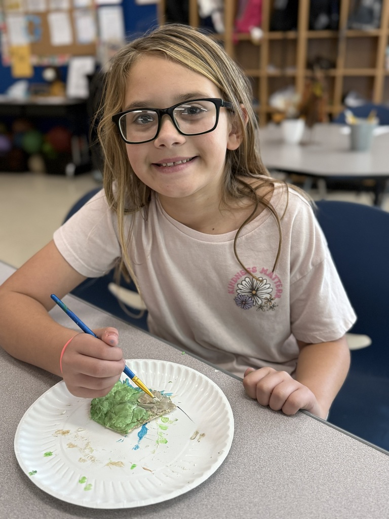 🗺️🎨 Topography in 3D! 🎨🗺️  Mrs. Still’s 5th Grade Social Studies class is diving into topographical maps, and today they brought their learning to life!  Students used air-dry clay to create 3D topographical maps of Arkansas, then painted them to reflect the state’s unique landforms and elevations.  What a fun and hands-on way to explore geography! 💙💛  #HarrisonMiddleSchool #GreatGoblins #SocialStudies #Topography #HandsOnLearning #ArkansasGeography #CreativeClassroom