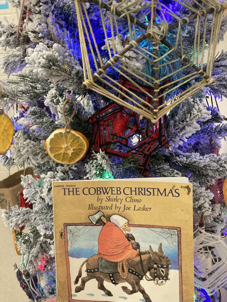 🎄📚 Holiday Spirit in Mrs. Walker’s Class! 📚🎄  Mrs. Walker’s class got into the holiday spirit today by reading Cobweb Christmas by Shirley Climo. This charming folktale shares German holiday traditions — including the story of how tinsel came to be used on Christmas trees!  What a fun and meaningful way to celebrate the season! 💙💛  #HarrisonMiddleSchool #GreatGoblins #HolidayReading #CobwebChristmas #FestiveLearning