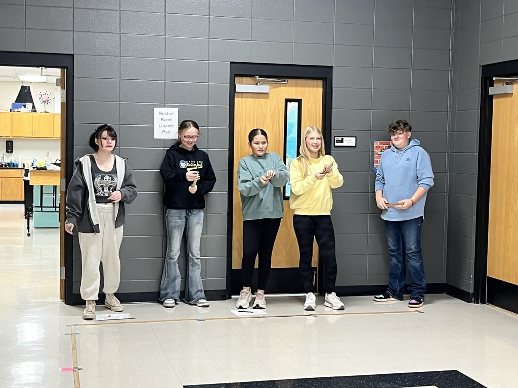 What a Stretch! Our Mrs. Bryant's 7th-grade scientists tested how the amount of stretch in a rubber band affects the distance it travels! Students pulled the rubber band back to 5 inches and 7 inches, recorded multiple trials, and compared their results.  They discovered that the more you stretch a rubber band, the more potential energy it stores—and the farther it flies when that energy turns into kinetic energy. 🚀  Hands-on learning = big discoveries! 🔬💡