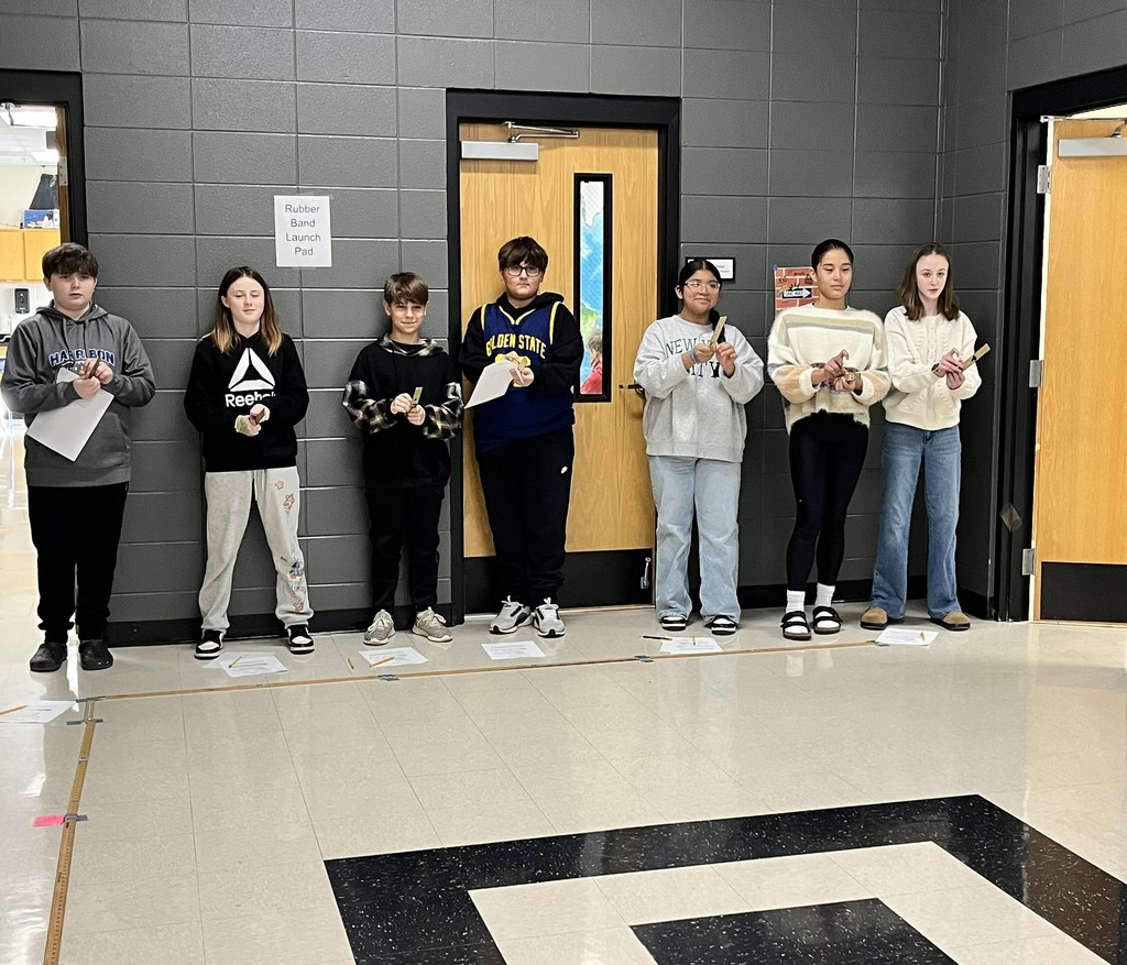 What a Stretch! Our Mrs. Bryant's 7th-grade scientists tested how the amount of stretch in a rubber band affects the distance it travels! Students pulled the rubber band back to 5 inches and 7 inches, recorded multiple trials, and compared their results.  They discovered that the more you stretch a rubber band, the more potential energy it stores—and the farther it flies when that energy turns into kinetic energy. 🚀  Hands-on learning = big discoveries! 🔬💡