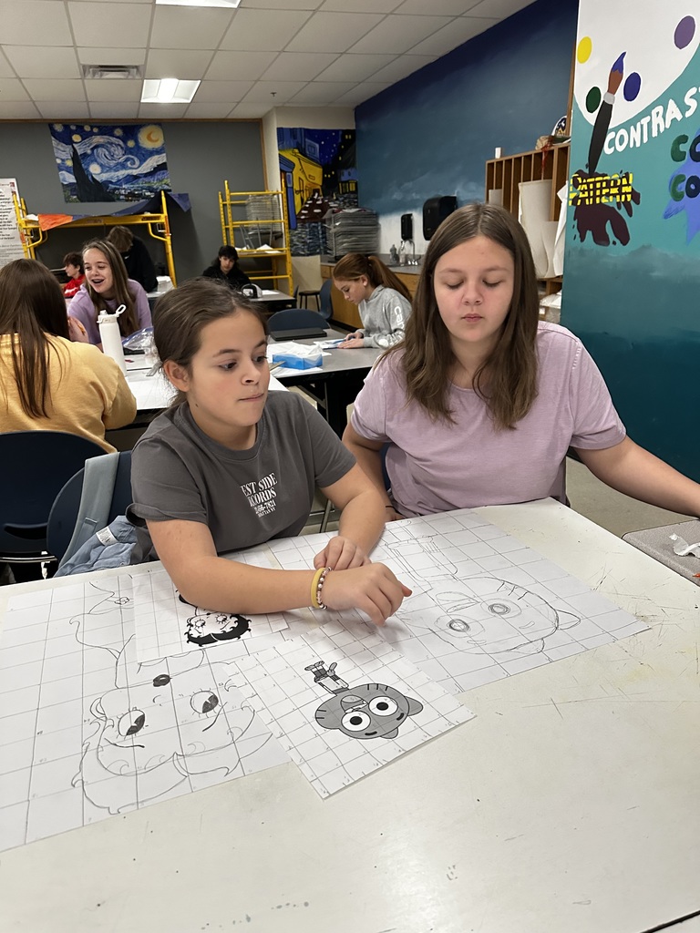 🎨📏 Amazing Gridline Art by Our 7th–8th Grade Students! 📏🎨  Our 7th and 8th Grade Art students have been hard at work on their Gridline Art projects — and their final pieces are truly fantastic!  The grid method encourages students to focus on small sections rather than the entire picture at once, helping them build confidence and accuracy. Several students found great success using this technique!  We’re so proud of their effort, patience, and creativity! 💙💛  #HarrisonMiddleSchool #GreatGoblins #HMSArt #GridlineArt #StudentArtists #CreativeClassroom